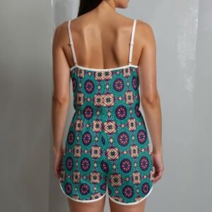 Woman wearing the Teal Mosaic Print Cami Romper by Creamy Cougar