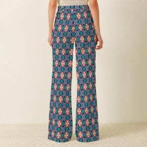 325888-091d01fa-8149-4eb0-8db8-369a05a2c280-2.jpg Woman wearing the Teal Coral Tile Print Wide Leg Pants by Creamy Cougar