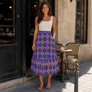 325888-4a7f8a9f-49c7-4b0a-98e7-f6a4b89ede93-2.jpg Woman wearing the Copper Medallion Print Tiered Ruffle Maxi Skirt by Creamy Cougar