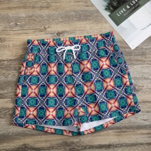 Woman wearing the Teal Coral Medallion Print Casual Shorts by Creamy Cougar