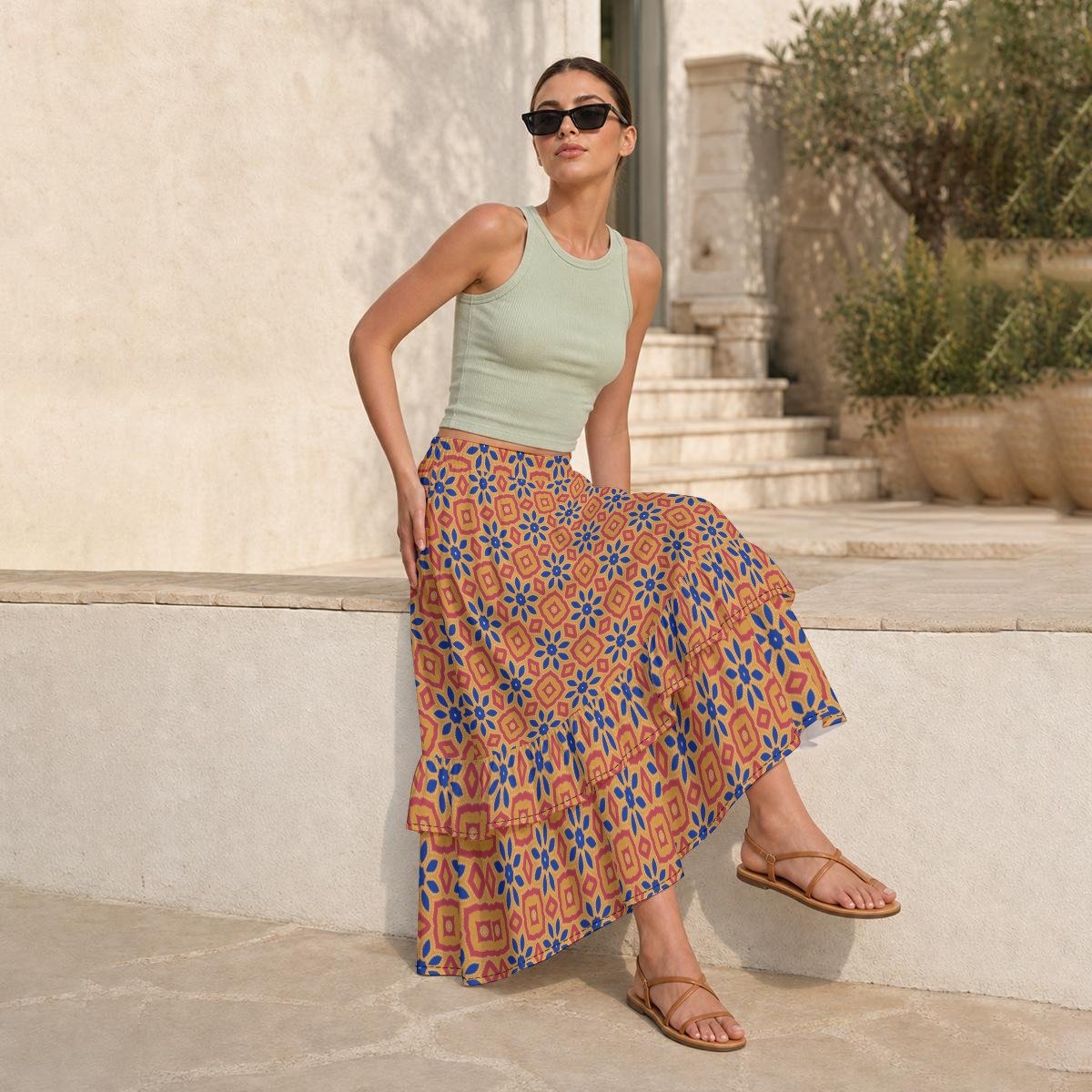 Woman wearing the Amber Medallion Print Tiered Ruffle Maxi Skirt by Creamy Cougar