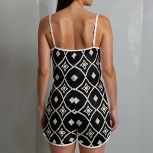 Woman wearing the Black & White Medallion Print Cami Romper by Creamy Cougar