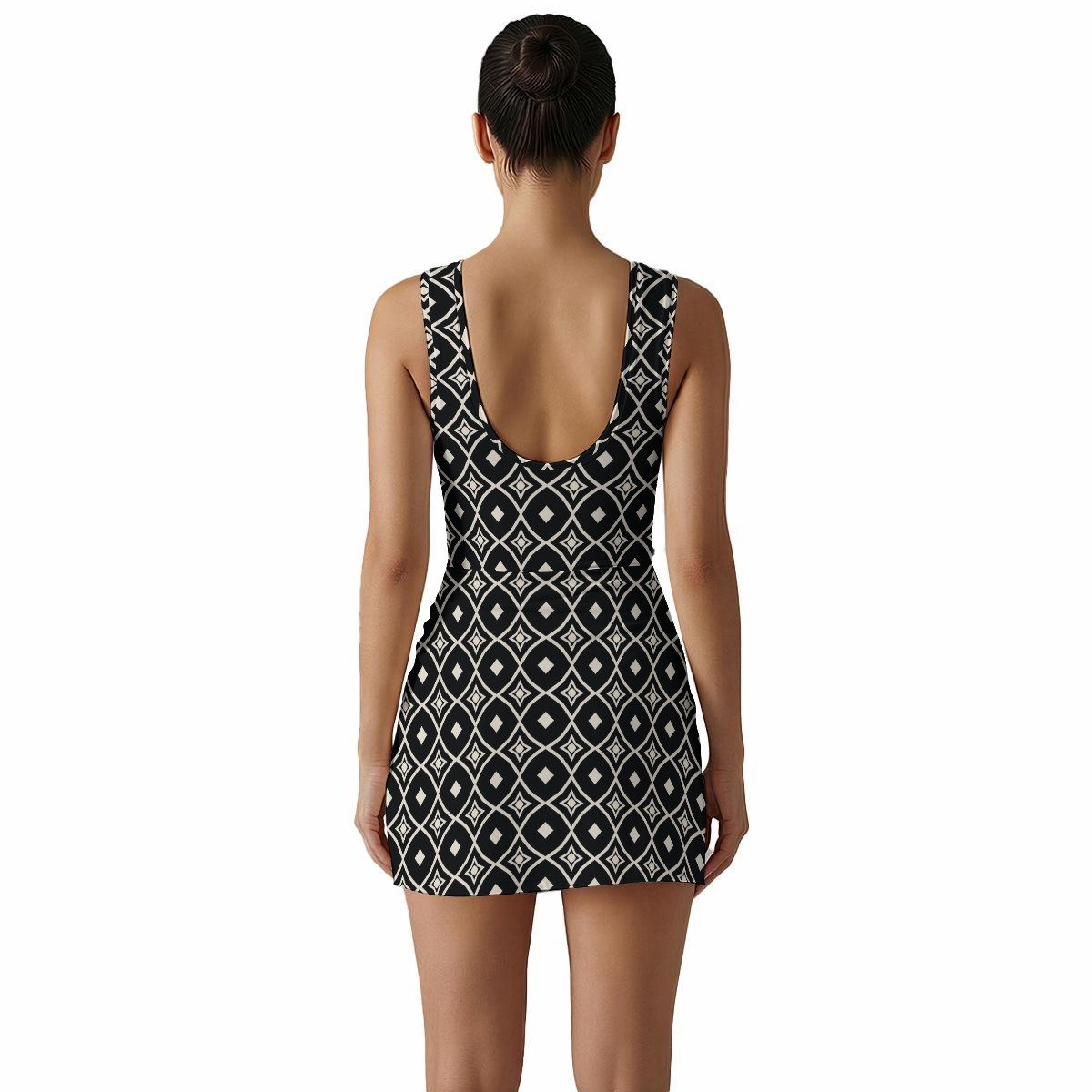 Woman wearing the Black & White Tile Print Sleeveless Bodycon Mini Dress by Creamy Cougar