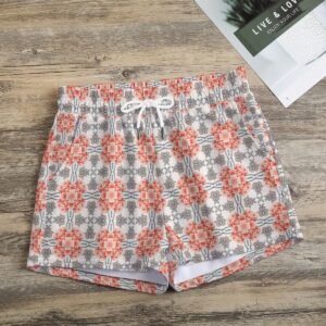 Woman wearing the Coral Grey Mosaic Print Casual Shorts by Creamy Cougar
