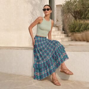 Woman wearing the Teal Medallion Print Tiered Ruffle Maxi Skirt by Creamy Cougar