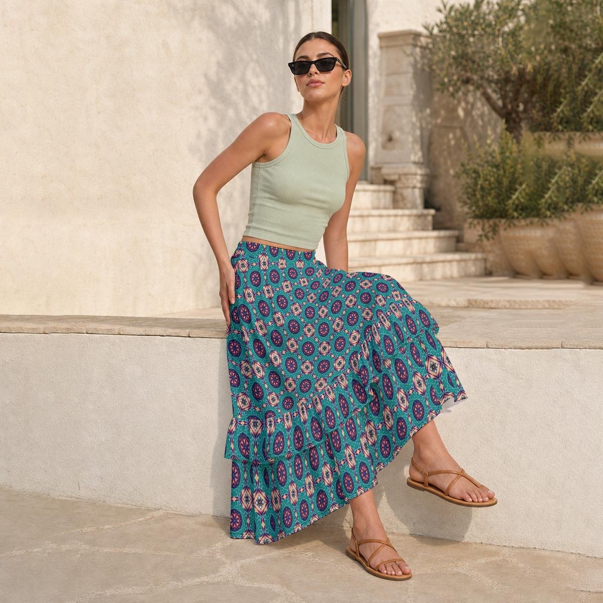 Woman wearing the Teal Medallion Print Tiered Ruffle Maxi Skirt by Creamy Cougar