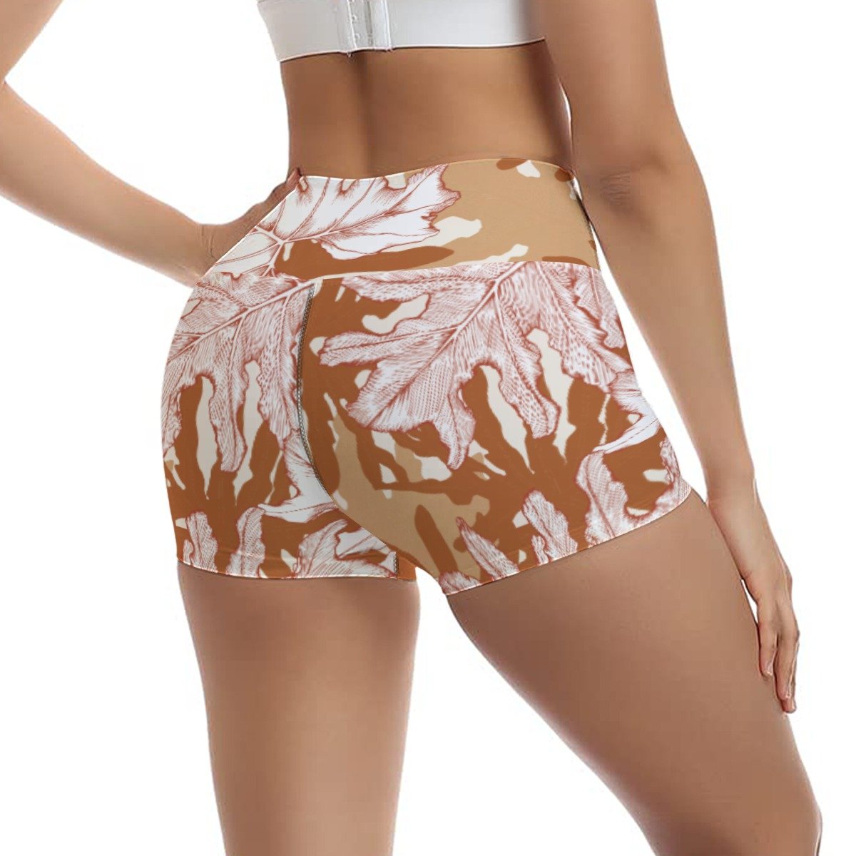 Woman wearing the Rust Palm Leaf Print Ultra-Short Yoga Shorts by Creamy Cougar