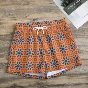 Woman wearing the Orange Grey Floral Tile Print Casual Shorts by Creamy Cougar