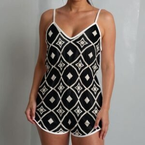 Woman wearing the Black & White Diamond Print Cami Romper by Creamy Cougar