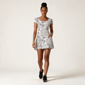 Woman wearing the Zebra Chevron Athletic Dress with Built-In Shorts by Creamy Cougar