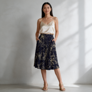 Woman wearing the Navy & Gold Floral Print Maxi Skirt with Pockets by Creamy Cougar
