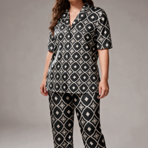 Woman wearing the Black & White Diamond Print Satin Pajama Set by Creamy Cougar