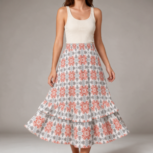 Woman wearing the Blush Tile Print Tiered Ruffle Maxi Skirt by Creamy Cougar