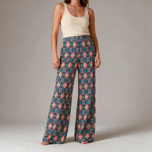 Woman wearing the Teal Coral Tile Print Wide Leg Pants by Creamy Cougar