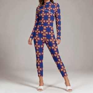 Woman wearing the Indigo Coral Medallion Print Long Sleeve High-Neck Jumpsuit by Creamy Cougar