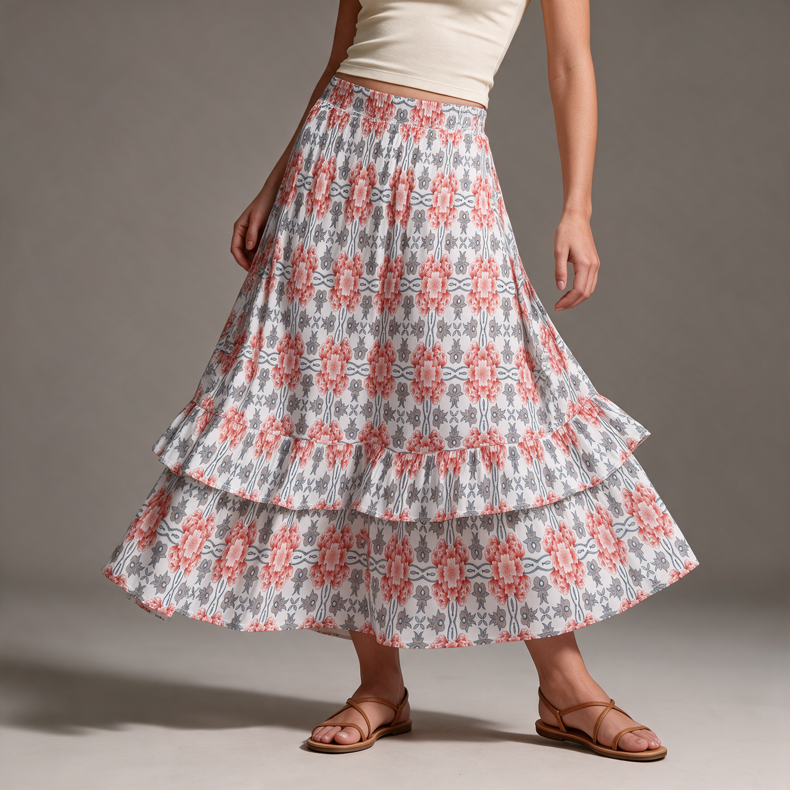 Woman wearing the Coral Blue Mosaic Print Tiered Ruffle Maxi Skirt by Creamy Cougar